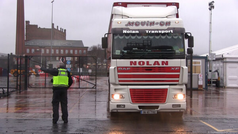 Stormont&#039;s Agriculture Minister Edwin Poots said that he wanted the issue of “unnecessary checks” to be addressed and said trading barriers were not benefiting Northern Ireland. Above a UK Border Force officers talk to a lorry driver at a checking facility near Belfast Harbour. 