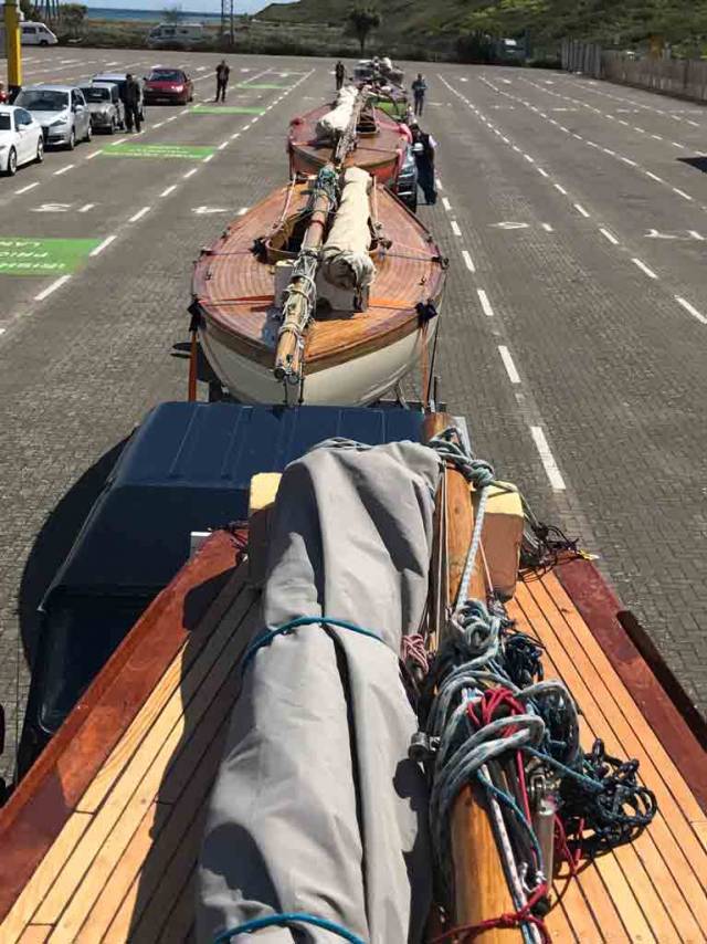 All lined up and ready to go.....the ancient Howth 17s have safely made it on trailers to Rosslare, and hope to transit France from Cherbourg tomorrow. In the foreground are the 1898-vintage Aura (cream hull) and astern of her is Leila, also 1898