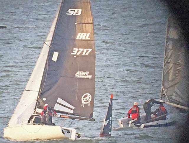 Justin Burke's SB20 Alert Packaging gives chase at Bay mark in last night's DBSC race 