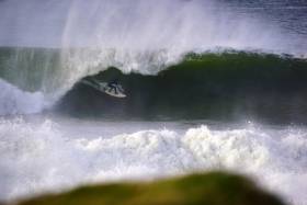 Former pro Fergal Smith pulls in to a barrel while surfing at home in Lahinch