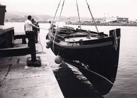 The Galway Hooker An Lady Mor being re-launched after restoration in Howth by Mick Hunt in 1985. Photo: W M Nixon