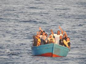 Migrants rescued from a wooden vessel located 40 Nautical Miles of Tripoli, Libya