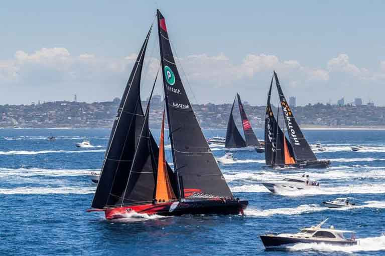 Racing for line honours: the SuperMaxis Comanche (Jim Cooney), Wild Oats XI (Oatley family) and Infotrack (ex Rambler 100, Christian Beck) making knots for Hobart in the 2018 race
