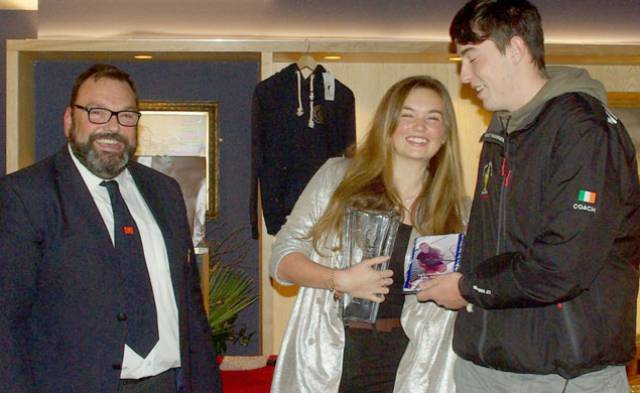 RCYC Vice Admral Colin Morehead with younger sailors Robyn Lynch and Tom McGrath, the winner of the Under 25 Sailor of the Year at last week's prizegiving
