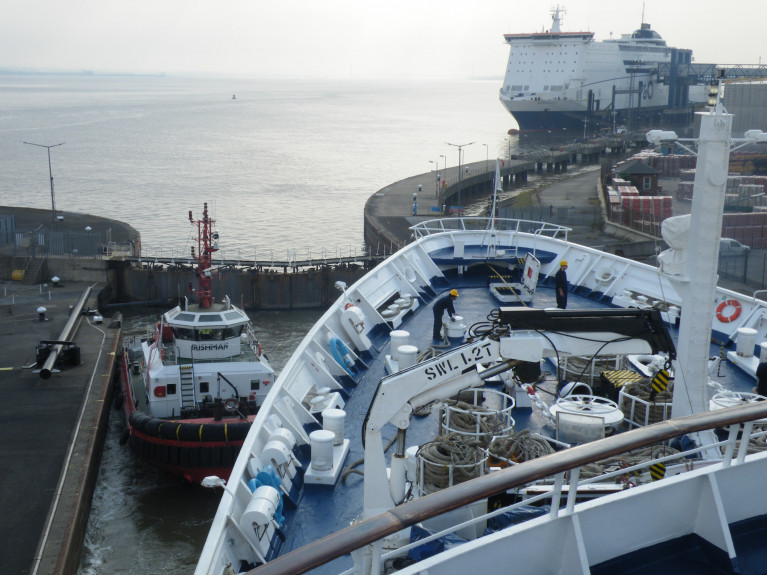 Protesters were planning a picket line at the Port of Hull (tommorrow, Saturday 26 March) to prevent the P&O Ferries Pride of Hull being loaded with cargo bound for the Dutch port of Rotterdam. The cruiseferry captured by AFLOAT at the UK port's (Humber berth) in recent years, features an 'Irish' bar. In the foreground the tug Irishman assisting cruiseship Marco Polo which called to Irish ports and which was scrapped in late 2020, following collapse of operator CMV due to the impact of the pandemic on the global cruise industry.
