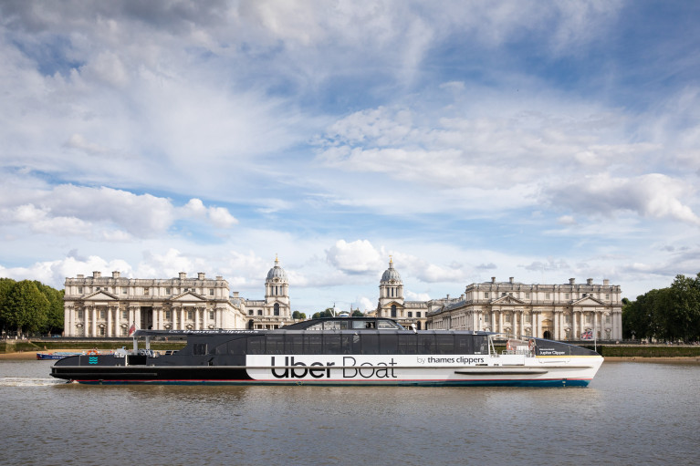 London Commuter's Call: The first branded 'Uber Boat' by Thames Clippers (Afloat above has identified as Jupiter Clipper) set sail on the River Thames today, marked the start of a partnership between Uber and commuter / tourism operator Thames Clippers. Unlike the Republic's August Bank holiday Monday, London cummuters today used the rebranded catamaran craft (with brackdrop of National Maritime Museum, Greenwich) where the new 'Black & White' livery clearly demonstrated a greater emphasis on 'Uber Boat' branding. This compared to the discreet all lower-case typeface of 'thames clippers' which is discernable albeit using smaller letters on the right.