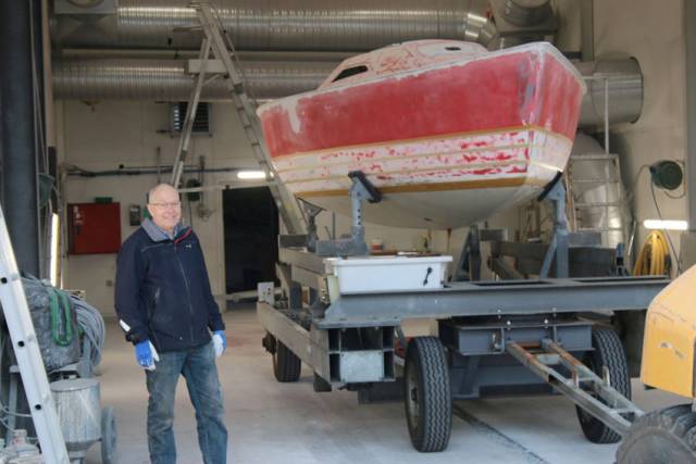 Birger Hansen with the restored hull of the first X-79 ready for paining
