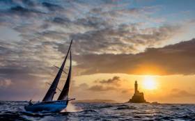  It may be Ireland’s Fastnet Rock at dawn, but it’s yet another successful French boat greeting the new day as veteran French sailor Catherine Pourre in her French-designed and French-built Class 40 Earendi races on to place third overall in Class40 in the Rolex Fastnet Race 2019