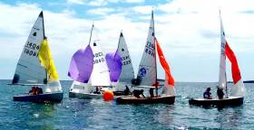 GP14s negotiate a gybe mark at Skerries during the Leinster Championships