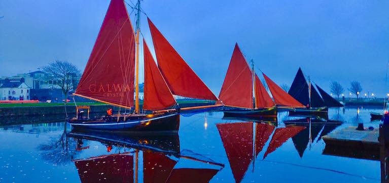 Traditional Galway Hooker boat moored in the Claddagh Basin