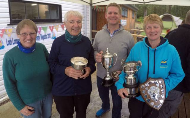 Top of the fleet at the Scottish Wayfarer Championship were (left to right) Margaret & Bob Sparkes (Loch Lomond SC) with Neil McSherry (National YC) and multiple champion Monica Schaefer (Greystones SC).
