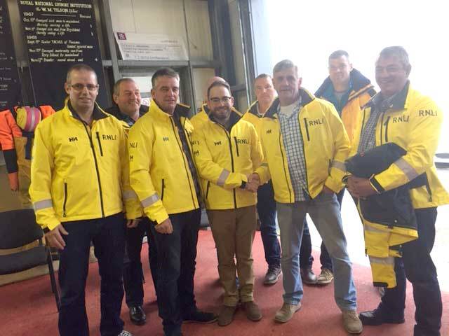 Fr Liam Boyle (pictured centre) served on the RNLI Arranmore lifeboat in Donegal