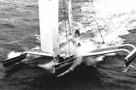 The Eric Tabarly-skippered trimaran Cote d’Or III racing to Dun Laoghaire in the Tag Heuer Round Europe Race 1987