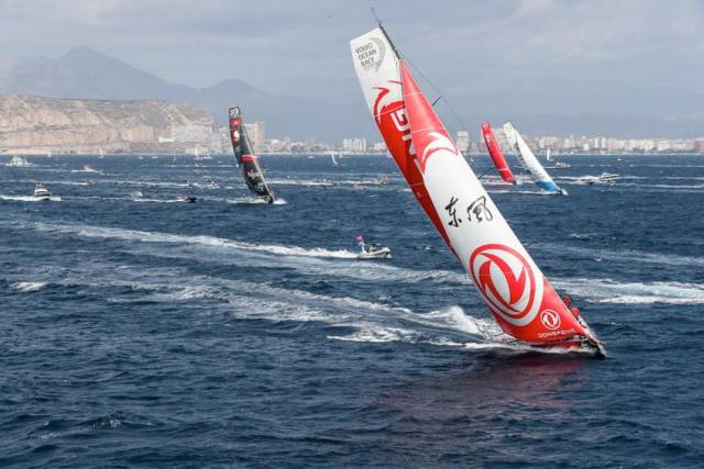 Dongfeng Race Team in the foreground as the fleet sprints out of Alicante on Sunday afternoon