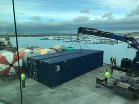 The new containers are moved into position at the Irish Lights Depot