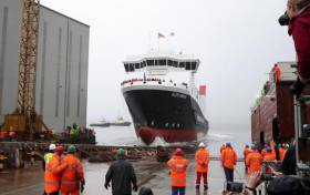 Glen Sannox the first of two new ferries for Scottish west coast isles operator Calmac had been expected this year. Afloat adds the shipyard, Ferguson Marine above is where Glen Sannox was launched earlier this year in Port Glasgow by Scottish First Minister, Nicola Sturgeon.