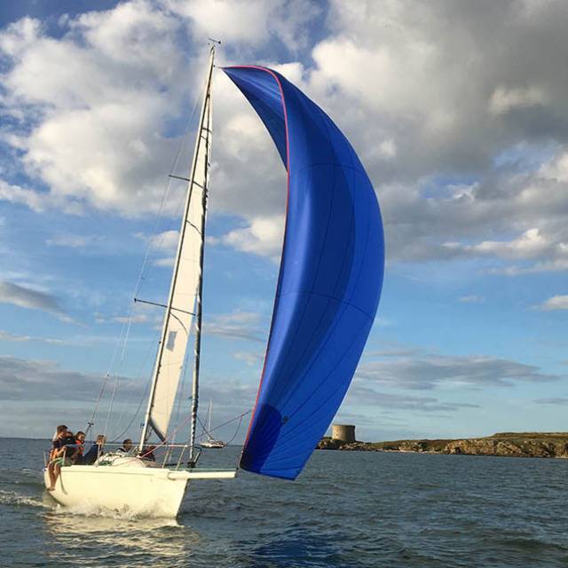 One of Howth YC’s club-owned J/80s coming through the sound inside Ireland’s Eye. The HYC-owned flotilla is well booked for the current season, and five fully-crewed Howth club-owned J/80s will be taking part in the Volvo Dun Laoghaire Regatta in July. Photo: Emmet Dalton