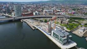 in this file photo taken earlier this year are initial construction stages of City Quays 2 development. Afloat adds that along the quay is where the old Isle of Man Steam Packet ferry terminal was located. In the background to the right of the tower under construction are the Belfast Harbour Commissioners headquarters. 