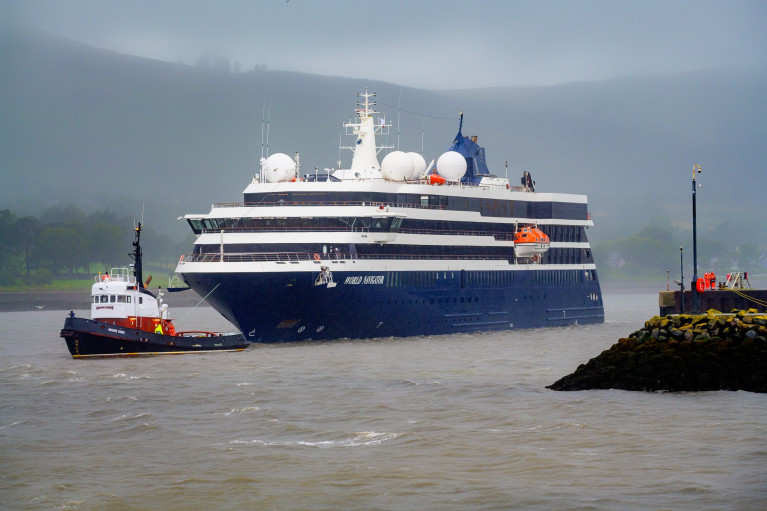 The first cruise ship since 2017 to visit Warrenpoint Port is the World Navigator as seen arriving today during inclement weather along with tug Mourne Shore in attendance. 