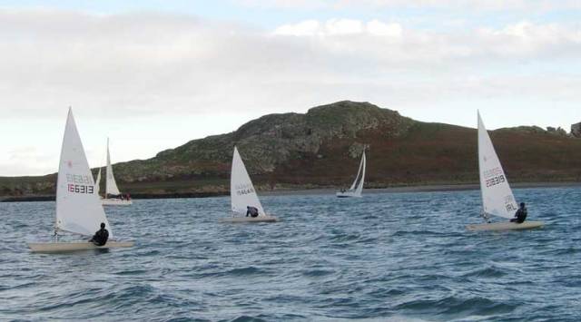 Ronan Wallace leads Dave Quinn in Race one of the Howth Laser Frostbites, 2nd December   