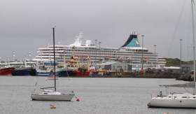 Yachts at moorings and large trawlers docked in Killybegs. Also berthed in the Co. Donegal port Afloat adds is German cruise operator Phoenix Reisen&#039;s Artania 