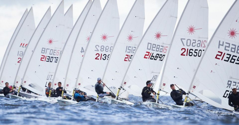 Finn Lynch (216890) and Liam Glynn (216507) next to each other on day two of the Laser Europeans in Poland