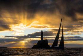 Morning has broken as the biggest boat in the Rolex Fastnet Race 2017, the JV 115 (Tom Brewer) rounds the Fastnet Rock. 