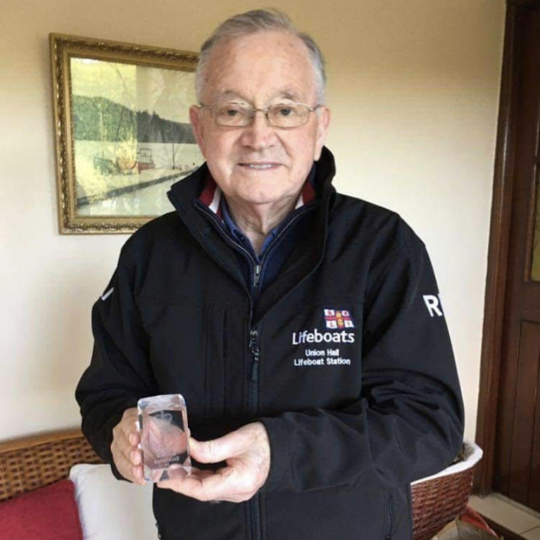 Brian Crowley with his award