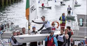 Silver medal winner Howth Yacht Club&#039;s Ewan McMahon is carried ashore at the Royal St. George Yacht Club in Dun Laoghaire