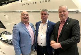 MGM Boats John O&#039;Kane (left) from Belfast Lough with Martin (centre) and Gerry Salmon of MGM Boats in Dublin on board the boot Dusseldorf 2018 Prestige stand with the new 70-foot Prestige 680s