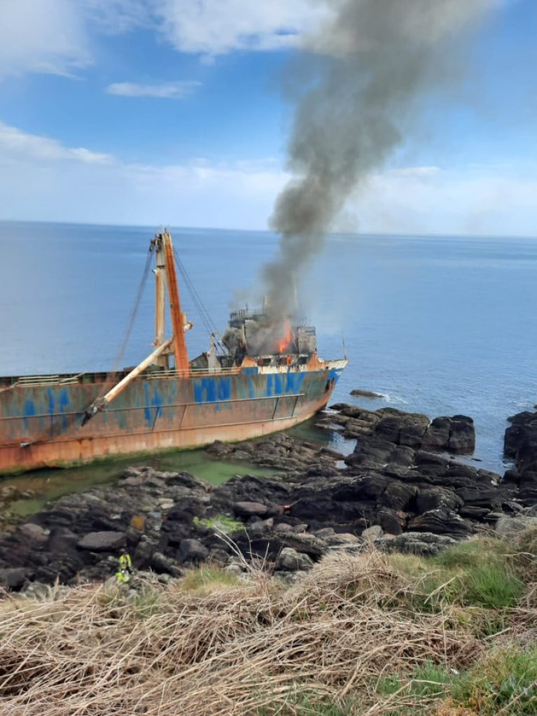 Two units of Cork County Council&#039;s Fire Service in attendance at the scene of a fire on board the shipwrecked MV Alta near Ballycotton, Co. Cork.