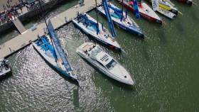 The self-docking boat slides with ease between the hulls of Volvo Ocean Race entries Turn the Tide on Plastic and Vestas 11th Hour Racing in Gothenburg