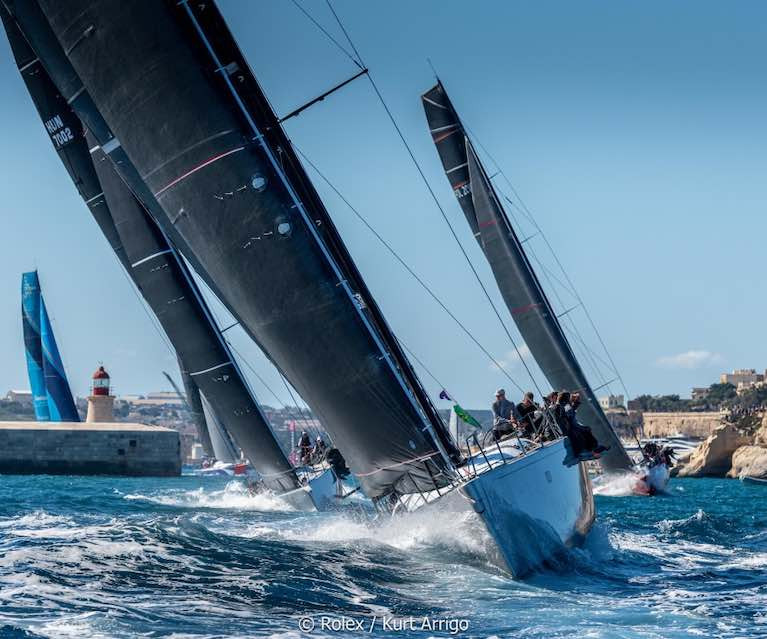 Tacks-free zone……the R-P/Marteen 72 Aragon leads the Rolex Middle Sea Race start out of Valetta Harbour with Nin O'Leary on the helm in an exemplary tacking-free exit