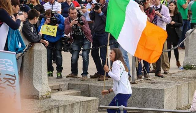 Step up: Annalise Murphy comes ashore at Dun Laoghaire Pier last night for well earned Olympic celebrations. Her result can boost Irish sailing