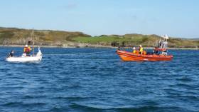 Baltimore’s inshore lifeboat taking the sailing vessel under tow
