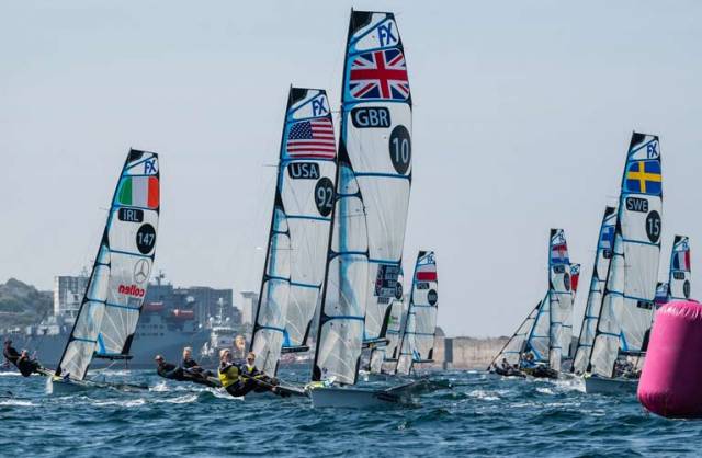 Team GB's Charlotte Dobson and Dun Laoghaire's Saskia Tidey (pictured centre, GBR 10) lead the fleet into a weather mark with Ireland's Annalise Murphy and Katie Tingle (left)