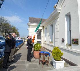 Lieutenant Commander Murphy raises the Tricolour at the National Yacht Club. The NYC commemorated the 70th anniversary of the Republic of Ireland with a special flag hoisting ceremony