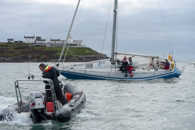 RCYC's Kieran O'Connell (in RIB) assists Winter league competitor Blue Oyster that went aground yesterday in Cork Harbour. Race three photo gallery below