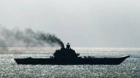 Time to clean the injectors? The powerful Russian aircraft carrier Admiral Kuznetsov may have created unhealthy amounts of smoke with her troublesome engines as she headed through the English Channel, but this is still one formidable fighting machine.