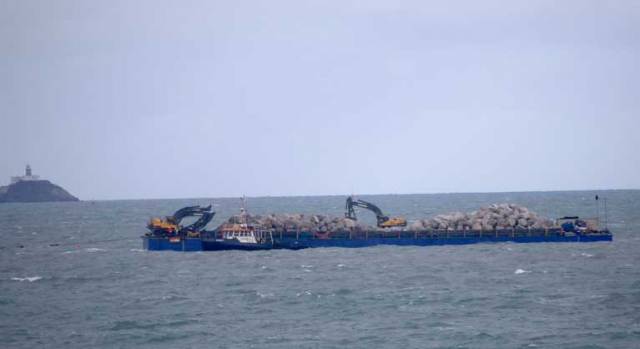Rock armour arrives into Dublin Bay by barge