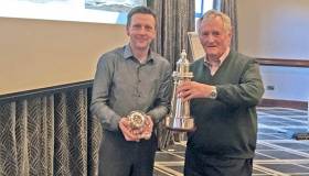 ICRA Commodore Simon McGibney presents the &#039;Boat of the Year&#039; Award to winning skipper George Sisk