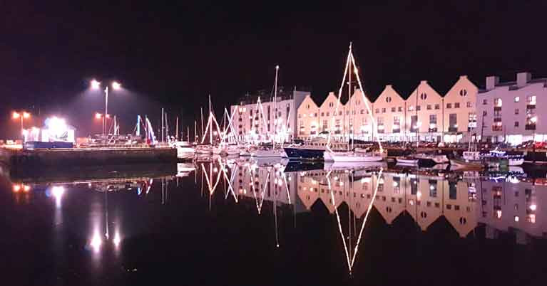 Winter Solstice 2019 with Christmas decorations in Galway Port Marina. Despite Storm Elsa less than three days earlier, the completely calm Halcyon day of midwinter arrived on cue