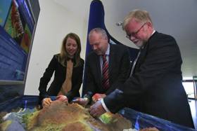 Gerald Fleming of Met Éireann with Eleanor O’Rourke and Mick Gillooly of the  Marine Institute checking out an AR sandbox, one of many interactive displays at the Marine Institute’s ‘Beneath Our Wild Atlantic’ exhibition during SeaFest from 2-3 July