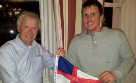 Solo sailor – NYC Commodore Ronan Beirne (left) salutes NYC member and Mini Transat entrant Tom Dolan in Dun Laoghaire