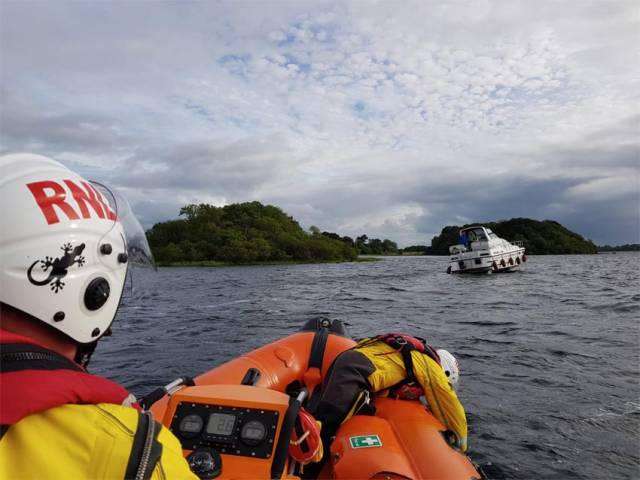 Lough Ree lifeboat volunteers approaching a motor cruiser run around earlier this week