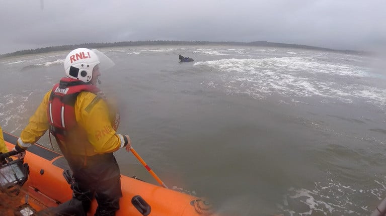 Lough Swilly RNLI approach the horse in the water at Murvagh