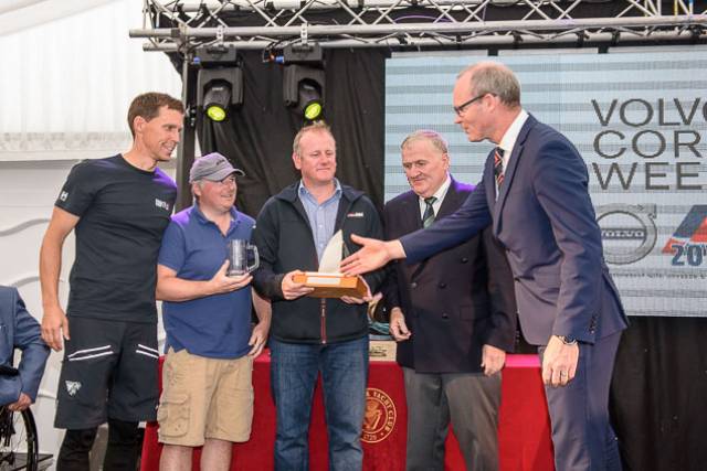Tánaiste and Minister for Foreign Affairs and Trade, Simon Coveney TD and Irish Sailing President Jack Roy congratulate the SB20 Sin Bin Crew at yesterday's Cork Week official opening ceremony 