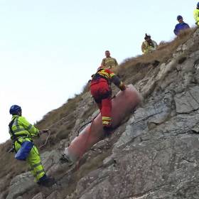 Rescuers taking the casualty up the cliff face at Ardglass on Tuesday afternoon 27 December