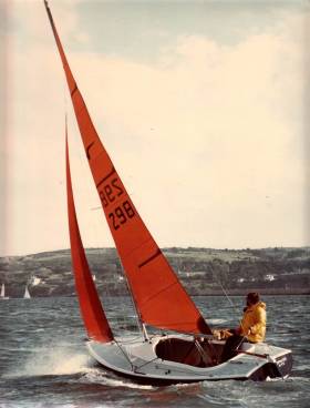 Headsail trim on the Nixon Squib in the good old days of forty years ago, with taut forestays and wide slots…