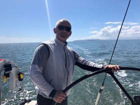 Prof O&#039;Connell at the helm of Royal St. George yacht ISORA yacht Aurelia
